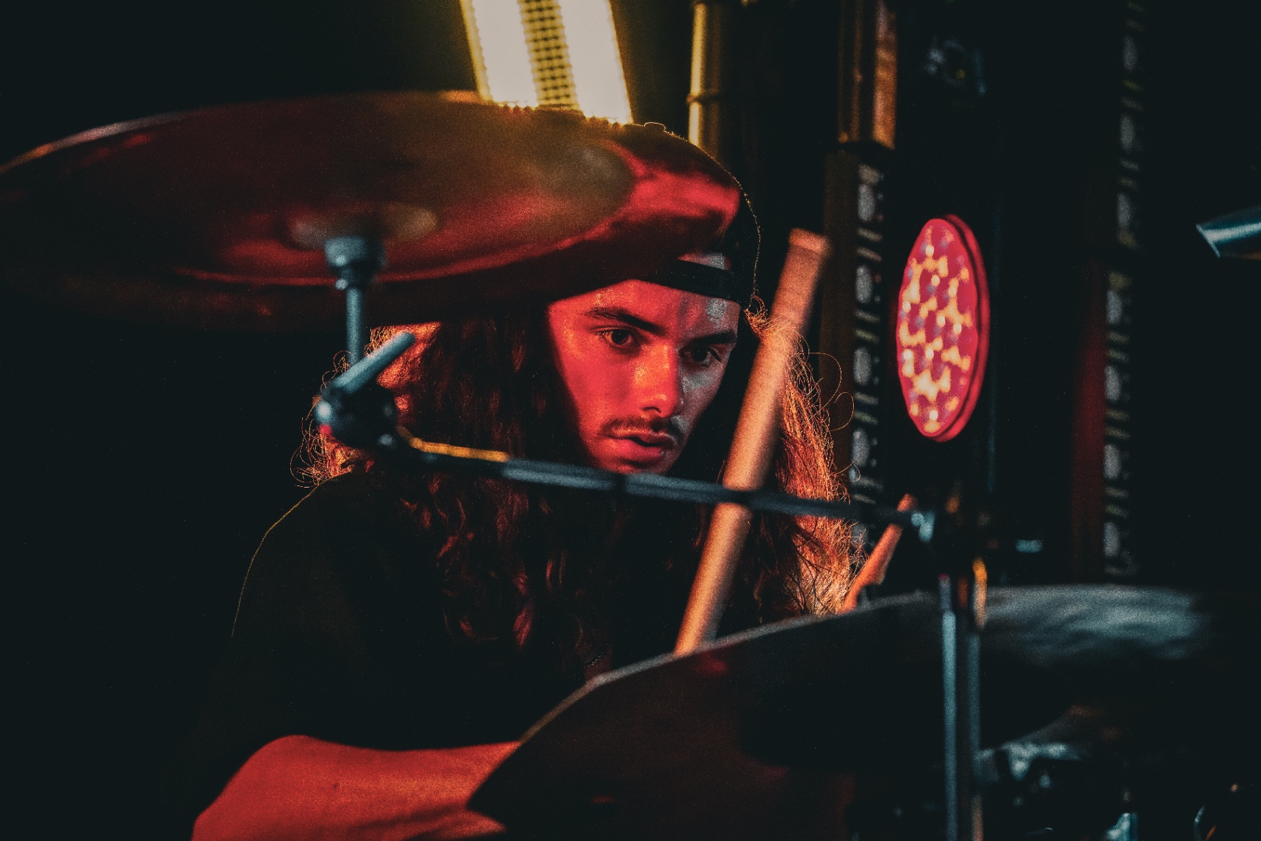Drummer in red light